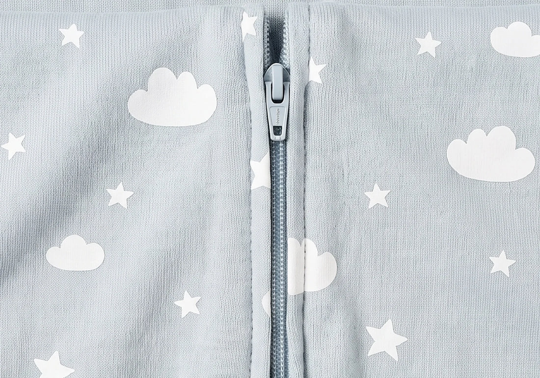 Close view of the centre-front zip running from the collar down the LIOR Held Swaddle Sack.