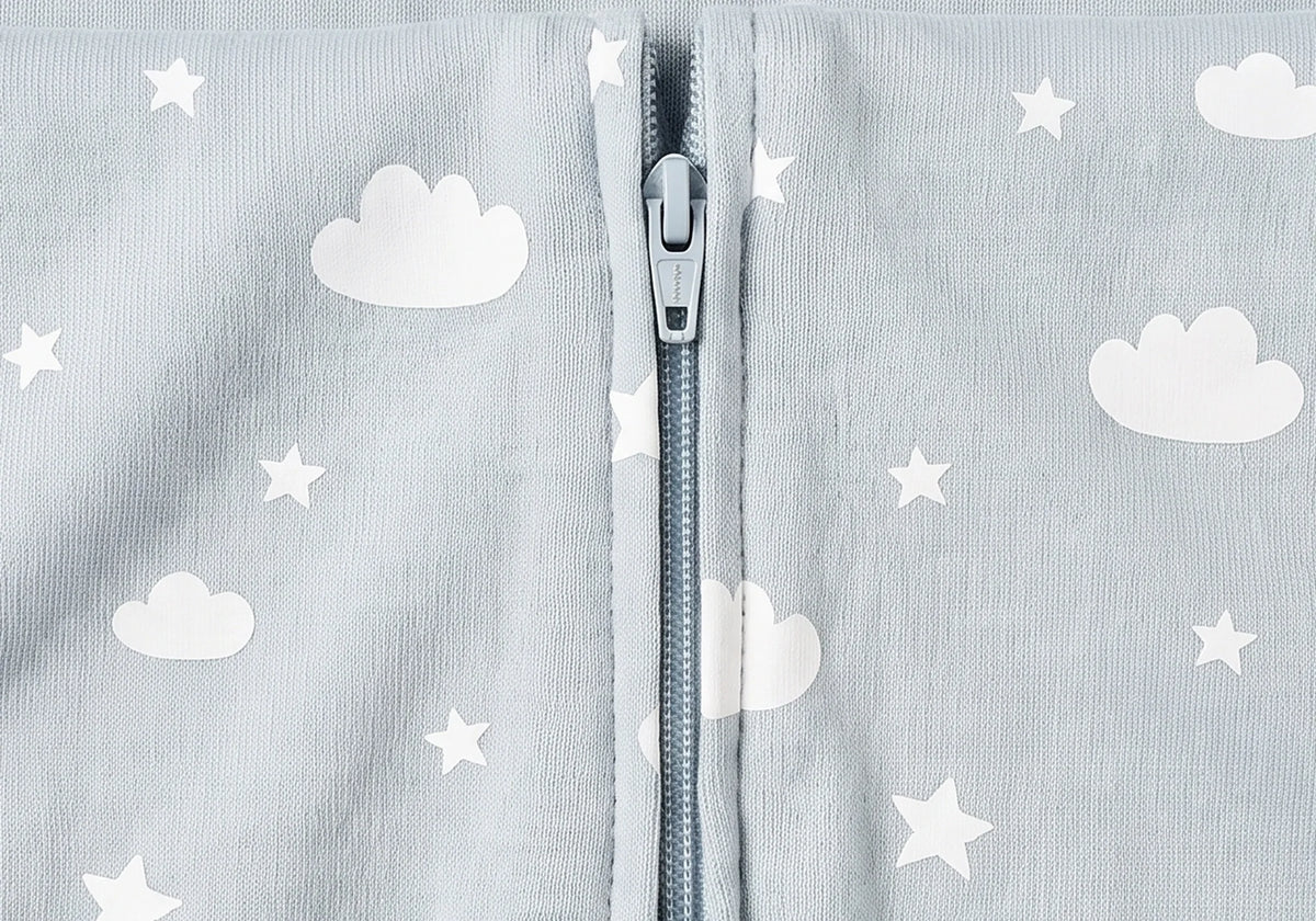 Close view of the centre-front zip running from the collar down the LIOR Held Swaddle Sack.