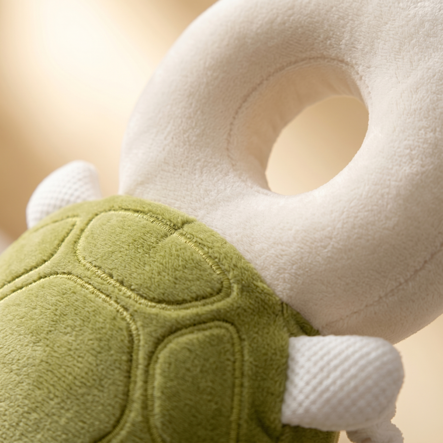 Lior Baby Safety Backpack — donut ring and turtle shell stitching detail
